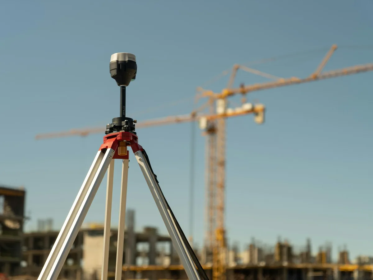 Surveying equipment set up at a construction site